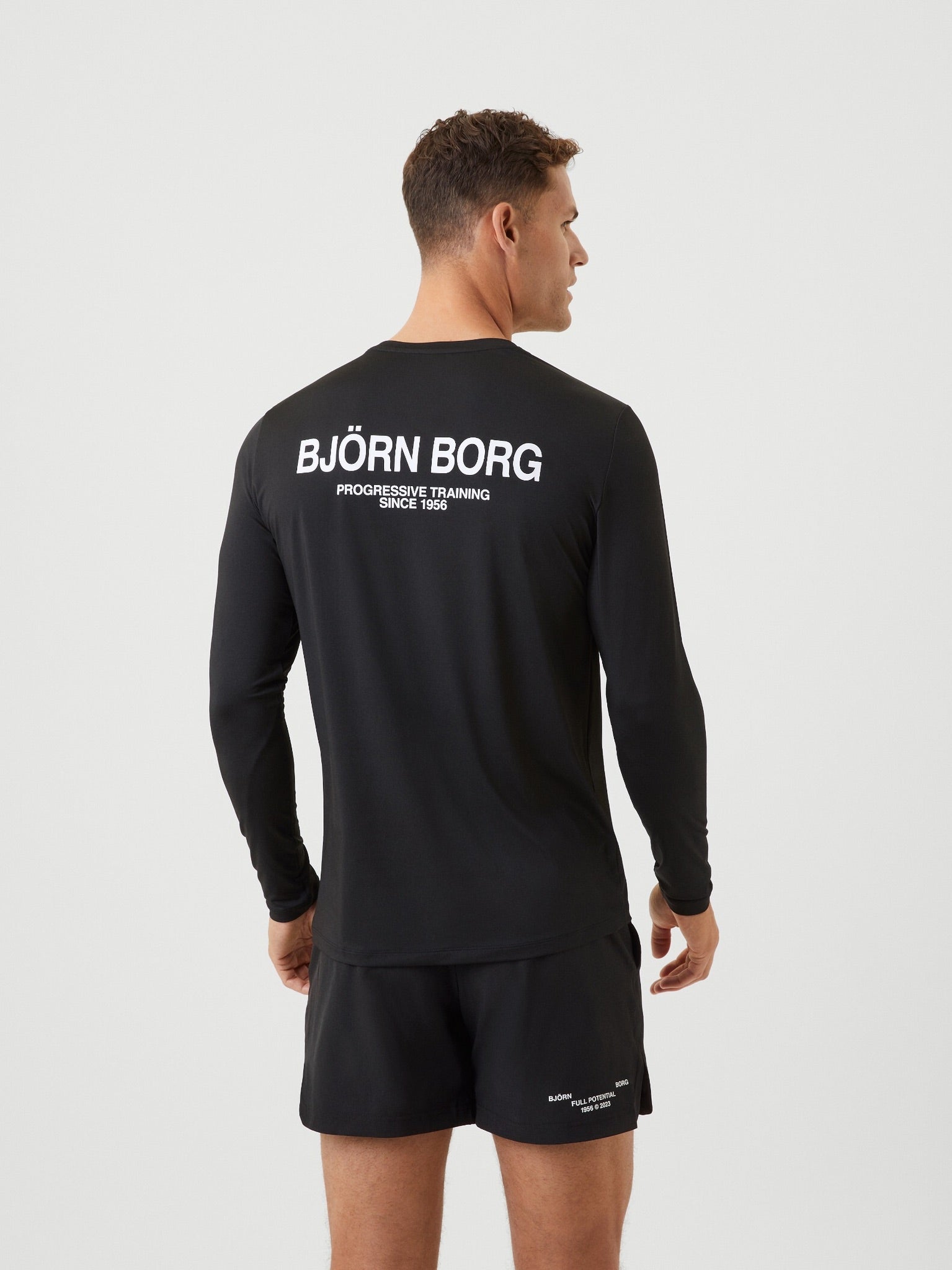 Björn Borg STHLM GRAPHIC LONG SLEEVE T-SHIRT, TENNISTRÖJA HERR – SVART